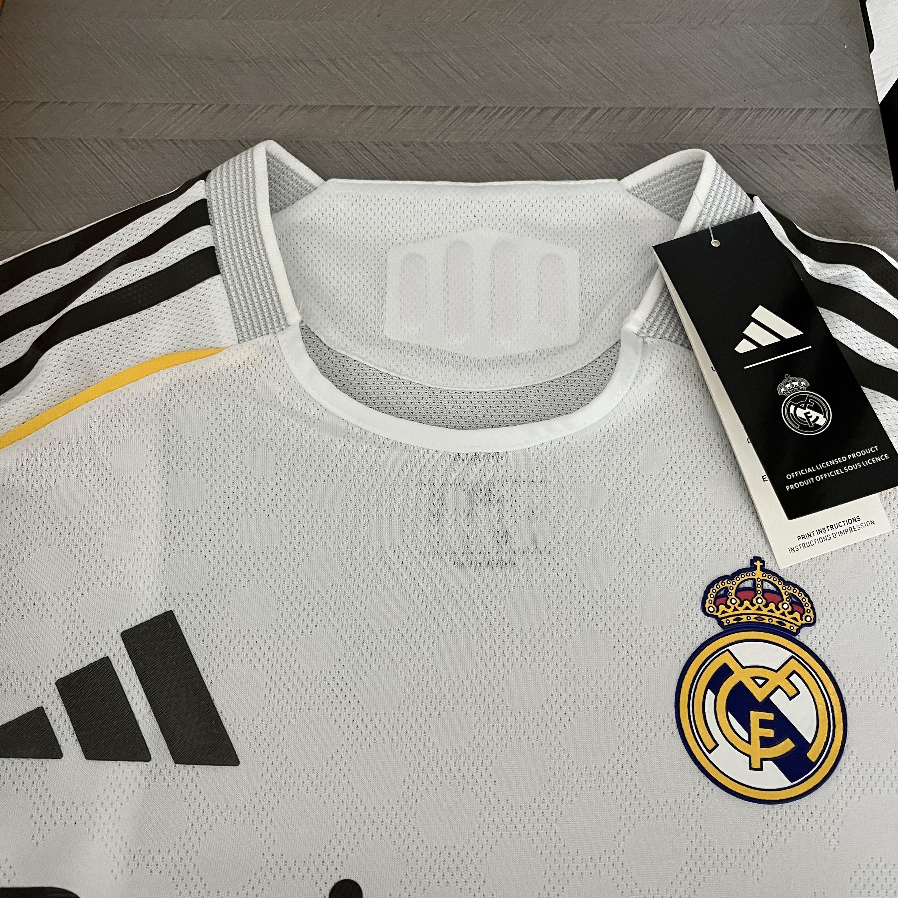 Camisa Real Madrid Titular 2025/26 - Versão Jogador Branco e Dourado
