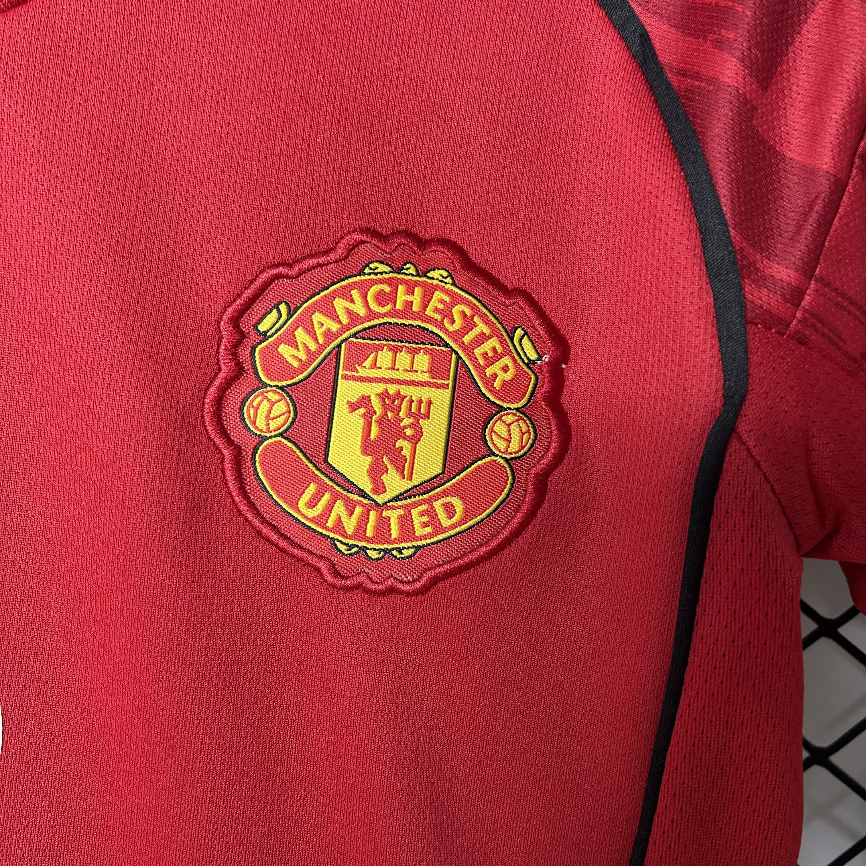 Conjunto Manchester United Home 25/26